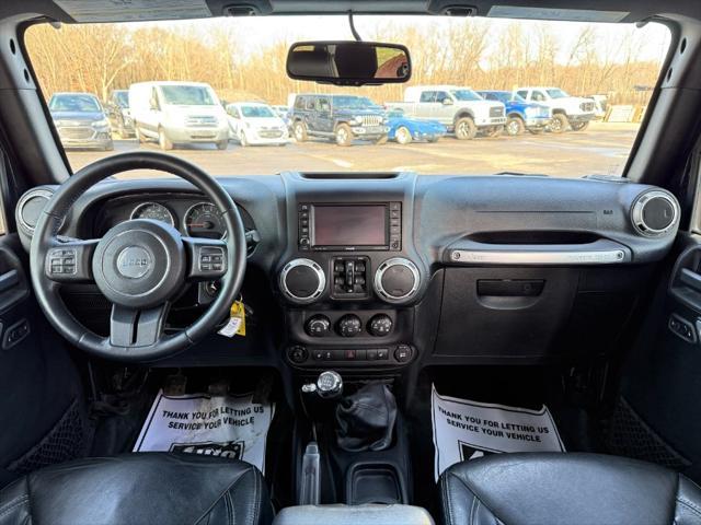used 2015 Jeep Wrangler Unlimited car, priced at $13,900