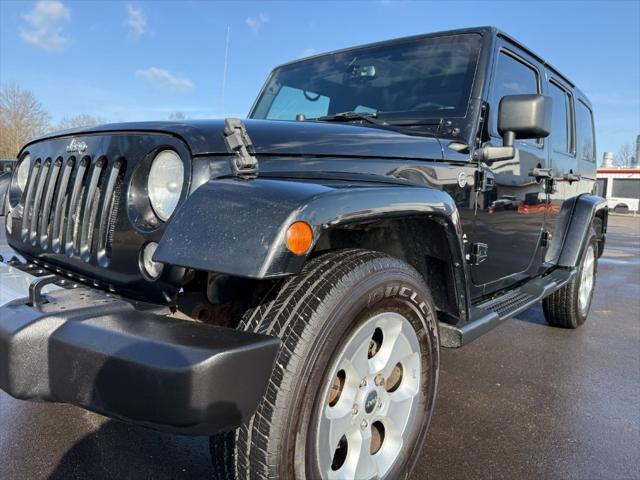 used 2015 Jeep Wrangler Unlimited car, priced at $13,900