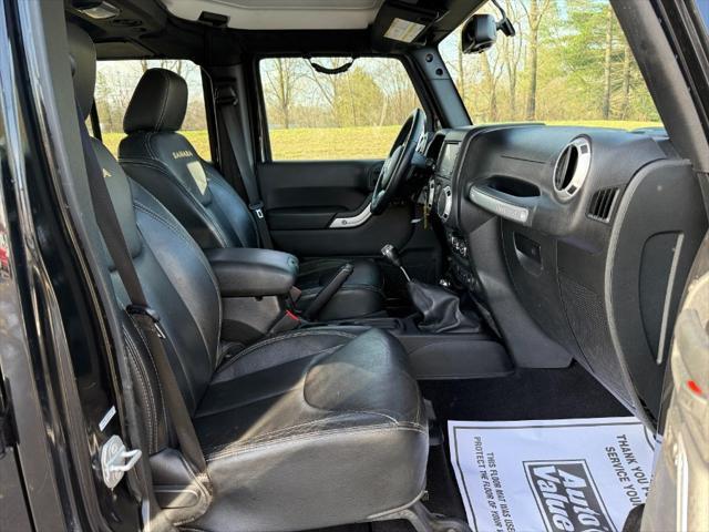 used 2015 Jeep Wrangler Unlimited car, priced at $13,900