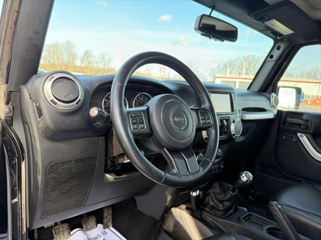 used 2015 Jeep Wrangler Unlimited car, priced at $13,900