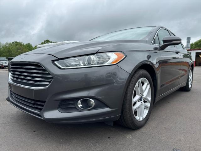 used 2016 Ford Fusion car, priced at $5,900