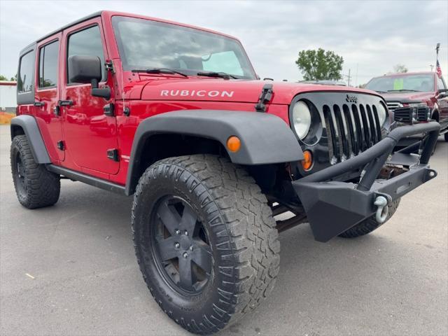 used 2011 Jeep Wrangler Unlimited car, priced at $9,900