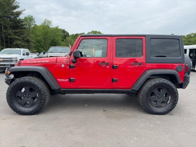 used 2011 Jeep Wrangler Unlimited car, priced at $9,900