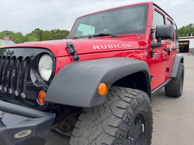 used 2011 Jeep Wrangler Unlimited car, priced at $9,900