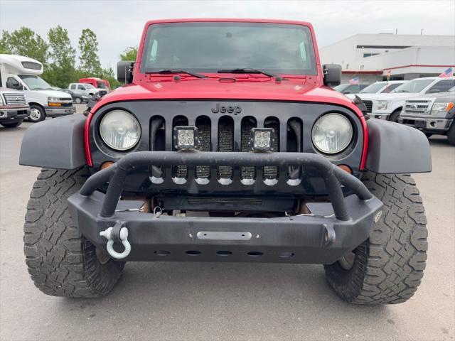 used 2011 Jeep Wrangler Unlimited car, priced at $9,900