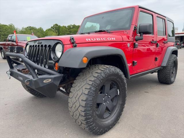 used 2011 Jeep Wrangler Unlimited car, priced at $9,900