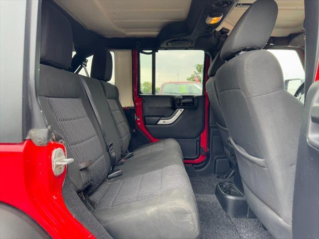 used 2011 Jeep Wrangler Unlimited car, priced at $9,900