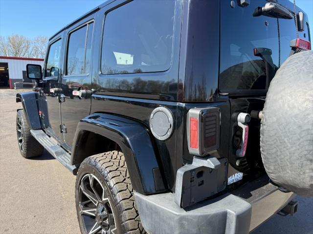 used 2011 Jeep Wrangler Unlimited car, priced at $10,900