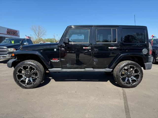 used 2011 Jeep Wrangler Unlimited car, priced at $10,900