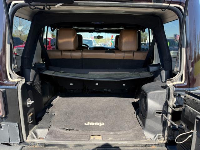 used 2011 Jeep Wrangler Unlimited car, priced at $10,900