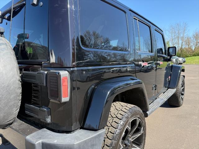 used 2011 Jeep Wrangler Unlimited car, priced at $10,900