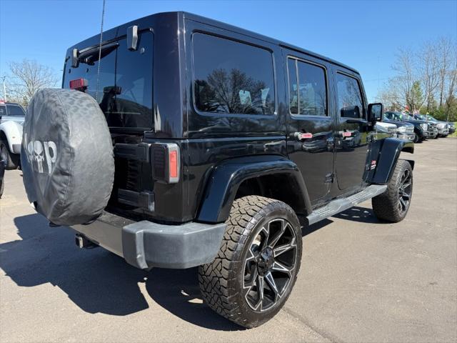 used 2011 Jeep Wrangler Unlimited car, priced at $10,900