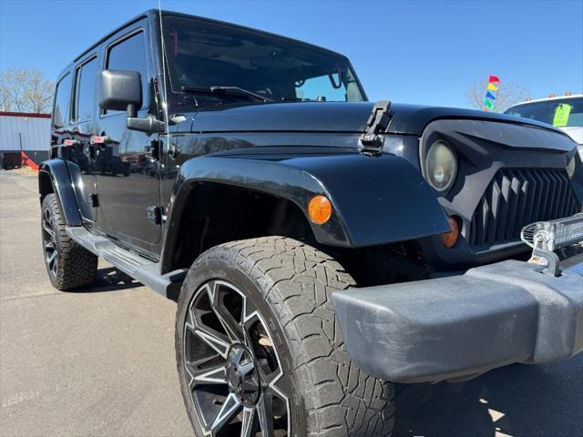 used 2011 Jeep Wrangler Unlimited car, priced at $10,900