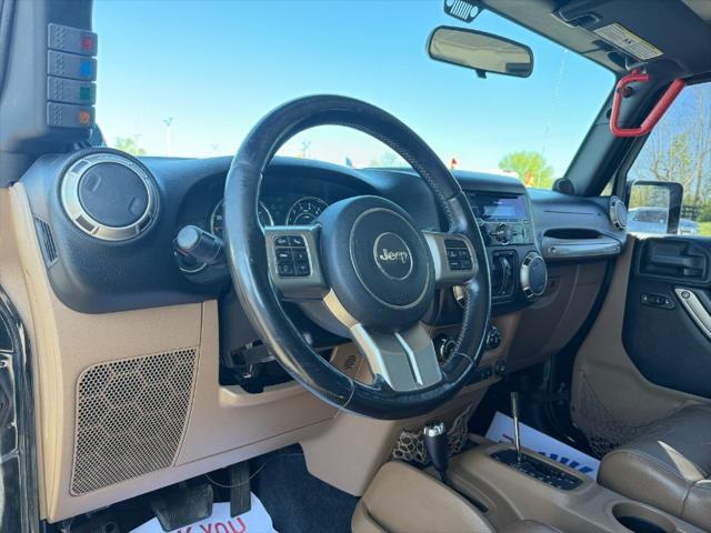 used 2011 Jeep Wrangler Unlimited car, priced at $10,900