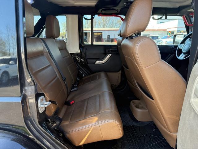 used 2011 Jeep Wrangler Unlimited car, priced at $10,900