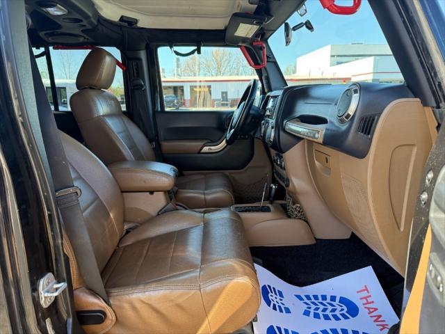 used 2011 Jeep Wrangler Unlimited car, priced at $10,900