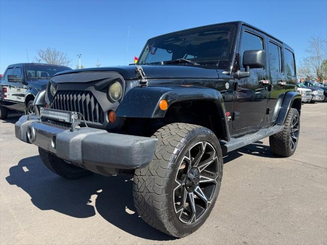 used 2011 Jeep Wrangler Unlimited car, priced at $10,900