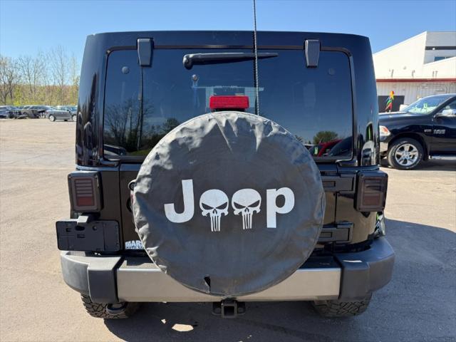 used 2011 Jeep Wrangler Unlimited car, priced at $10,900