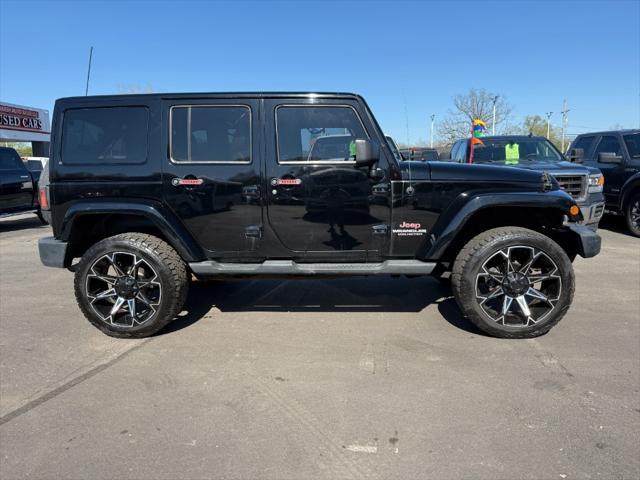used 2011 Jeep Wrangler Unlimited car, priced at $10,900