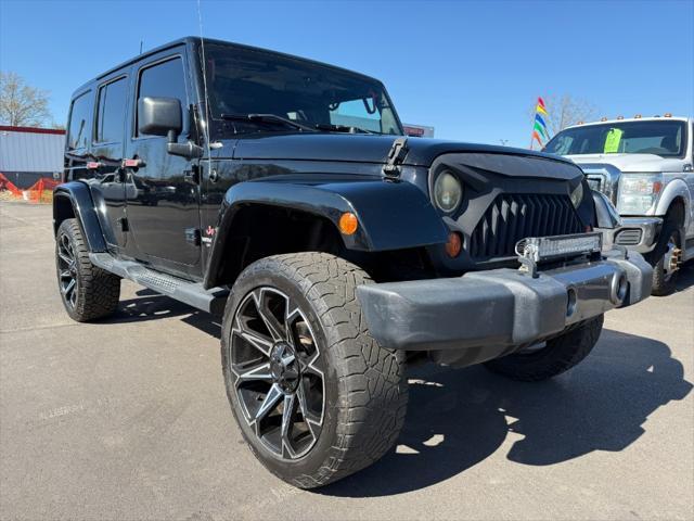 used 2011 Jeep Wrangler Unlimited car, priced at $10,900