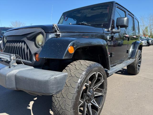 used 2011 Jeep Wrangler Unlimited car, priced at $10,900