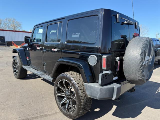 used 2011 Jeep Wrangler Unlimited car, priced at $10,900