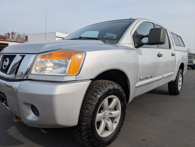 used 2014 Nissan Titan car, priced at $9,900