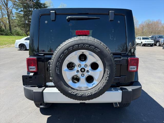 used 2013 Jeep Wrangler Unlimited car, priced at $13,900
