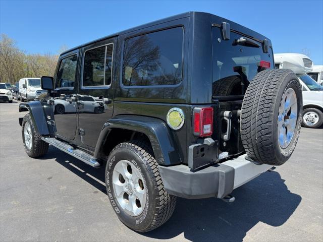 used 2013 Jeep Wrangler Unlimited car, priced at $13,900