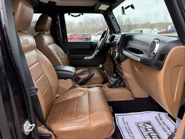 used 2011 Jeep Wrangler Unlimited car, priced at $9,900