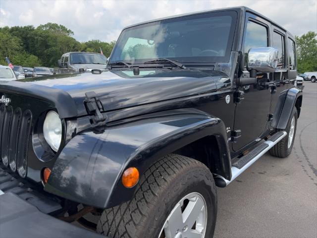 used 2011 Jeep Wrangler Unlimited car, priced at $8,900