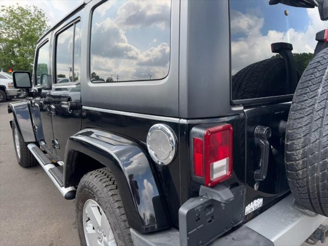 used 2011 Jeep Wrangler Unlimited car, priced at $8,900