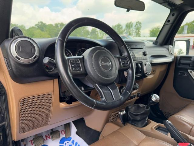 used 2011 Jeep Wrangler Unlimited car, priced at $8,900
