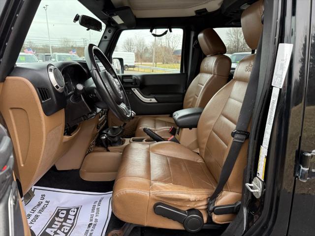 used 2011 Jeep Wrangler Unlimited car, priced at $9,900
