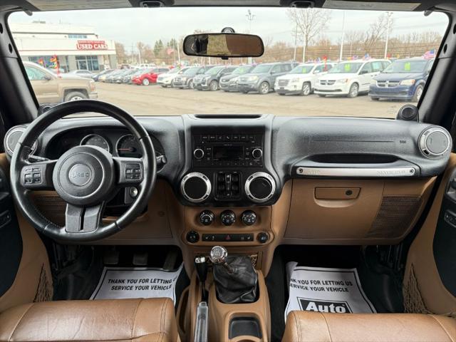 used 2011 Jeep Wrangler Unlimited car, priced at $9,900