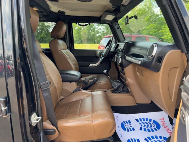 used 2011 Jeep Wrangler Unlimited car, priced at $8,900