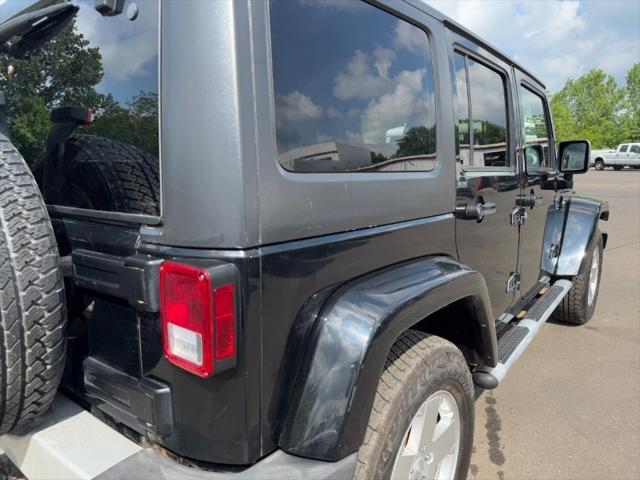 used 2011 Jeep Wrangler Unlimited car, priced at $8,900