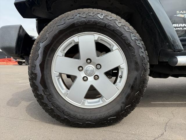 used 2011 Jeep Wrangler Unlimited car, priced at $9,900