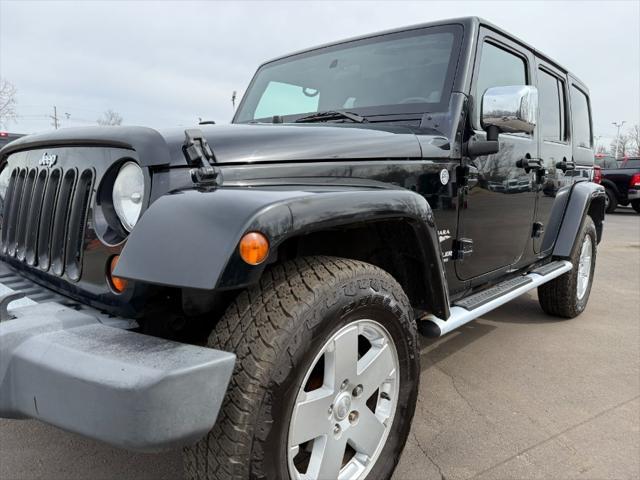 used 2011 Jeep Wrangler Unlimited car, priced at $9,900