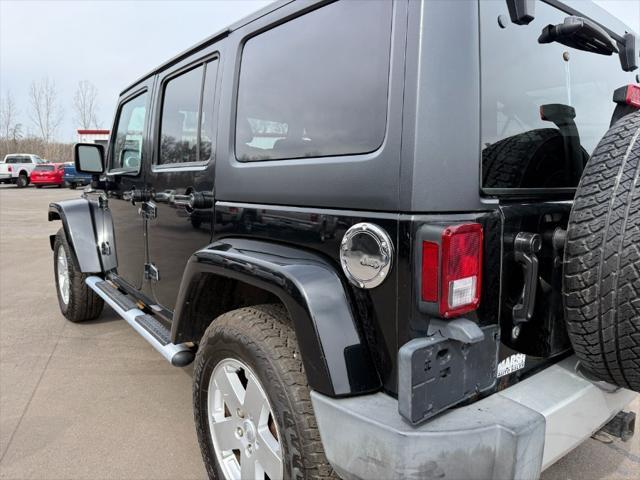 used 2011 Jeep Wrangler Unlimited car, priced at $9,900