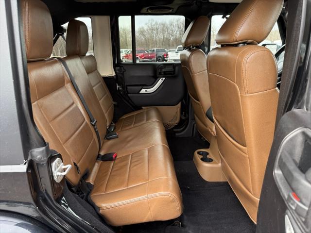 used 2011 Jeep Wrangler Unlimited car, priced at $9,900