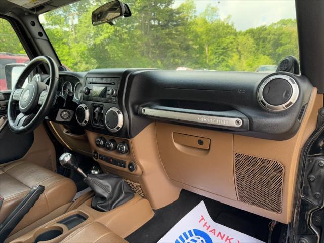 used 2011 Jeep Wrangler Unlimited car, priced at $8,900