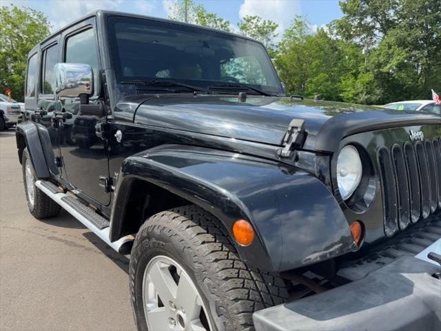 used 2011 Jeep Wrangler Unlimited car, priced at $8,900