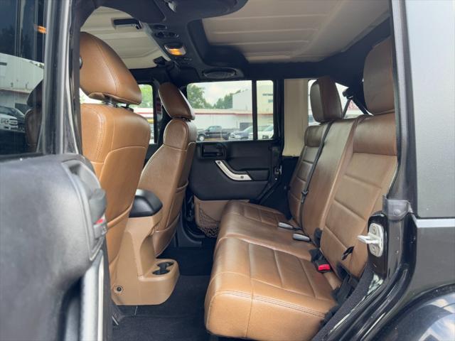 used 2011 Jeep Wrangler Unlimited car, priced at $8,900