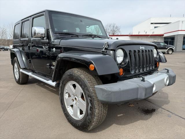 used 2011 Jeep Wrangler Unlimited car, priced at $9,900