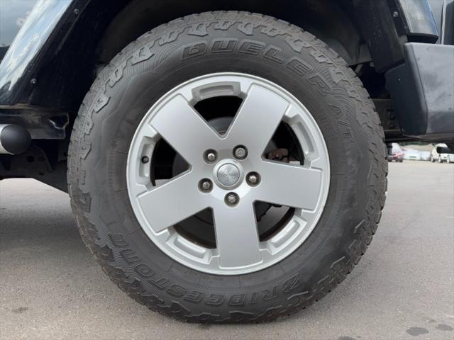used 2011 Jeep Wrangler Unlimited car, priced at $8,900