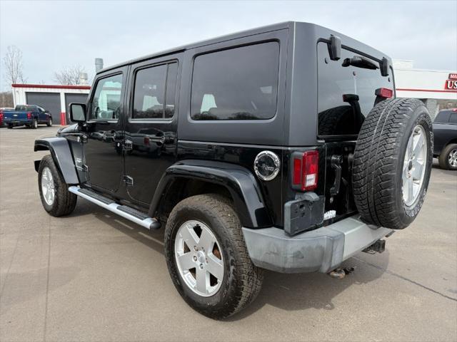 used 2011 Jeep Wrangler Unlimited car, priced at $9,900