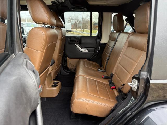 used 2011 Jeep Wrangler Unlimited car, priced at $9,900