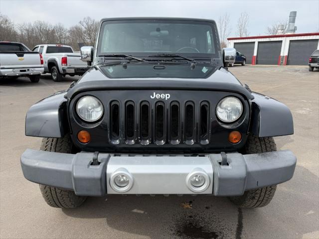 used 2011 Jeep Wrangler Unlimited car, priced at $9,900