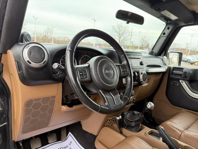 used 2011 Jeep Wrangler Unlimited car, priced at $9,900